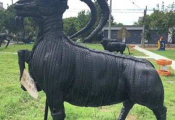澄邁輪胎山羊雕塑供應(yīng)，公園雕塑，鑄銅輪胎羊雕塑供求